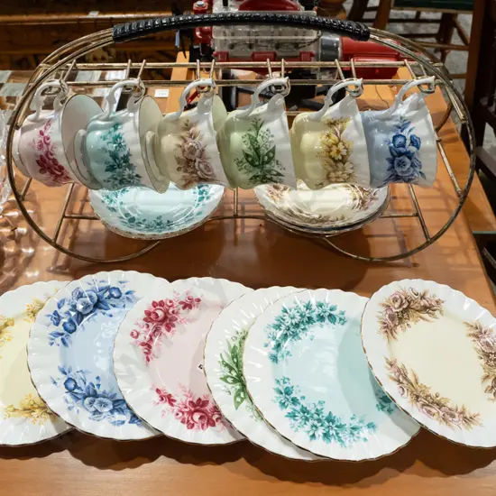 Royal Albert 'Melody' series trios 4x trios, 2x duos w/ wire rack. Wire rack H-230 L-430