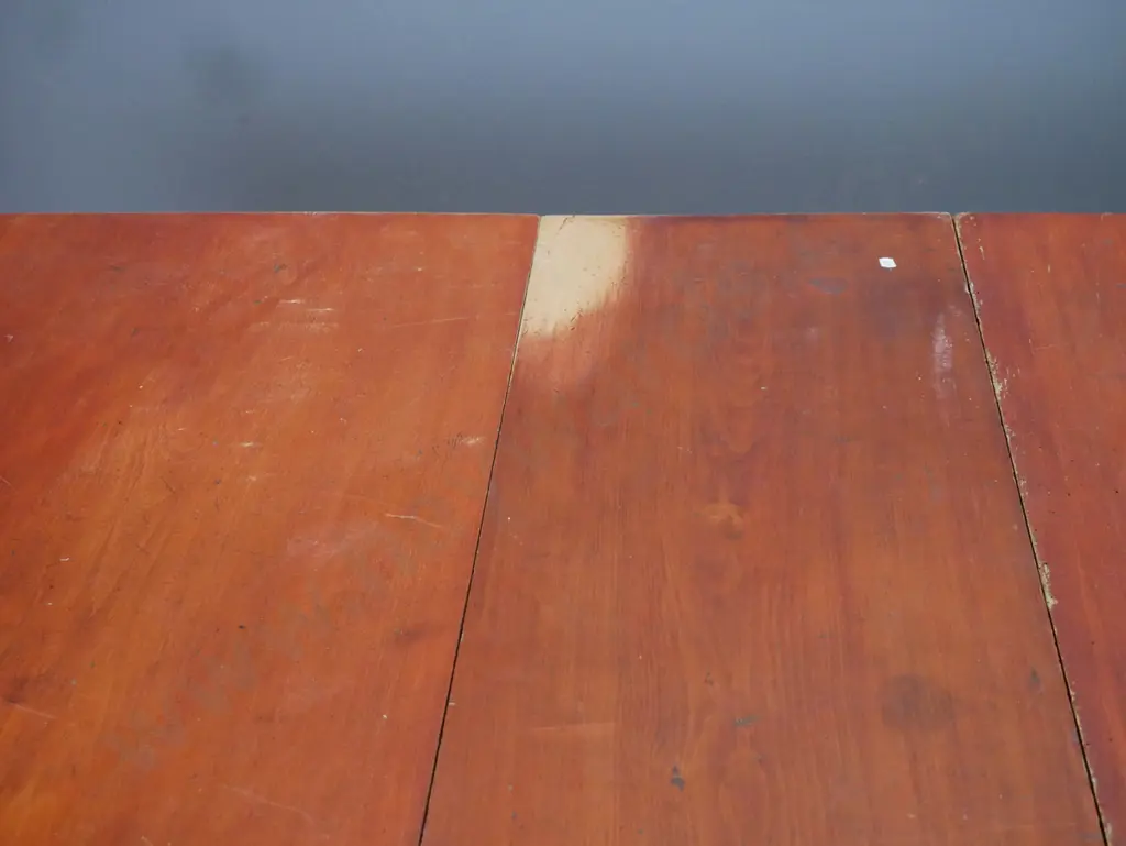 New Zealand colonial rimu turned leg wind out table, on white china cup casters. Has borer in the top Image 1++