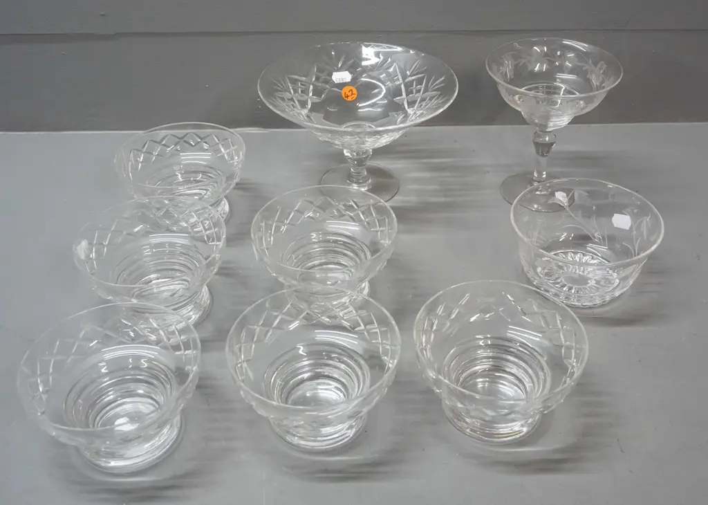assorted cut and etched crystal items, all but one marked Stuart - 6 matching footed bowls, 2 comports, taller is H-130 Image 1++