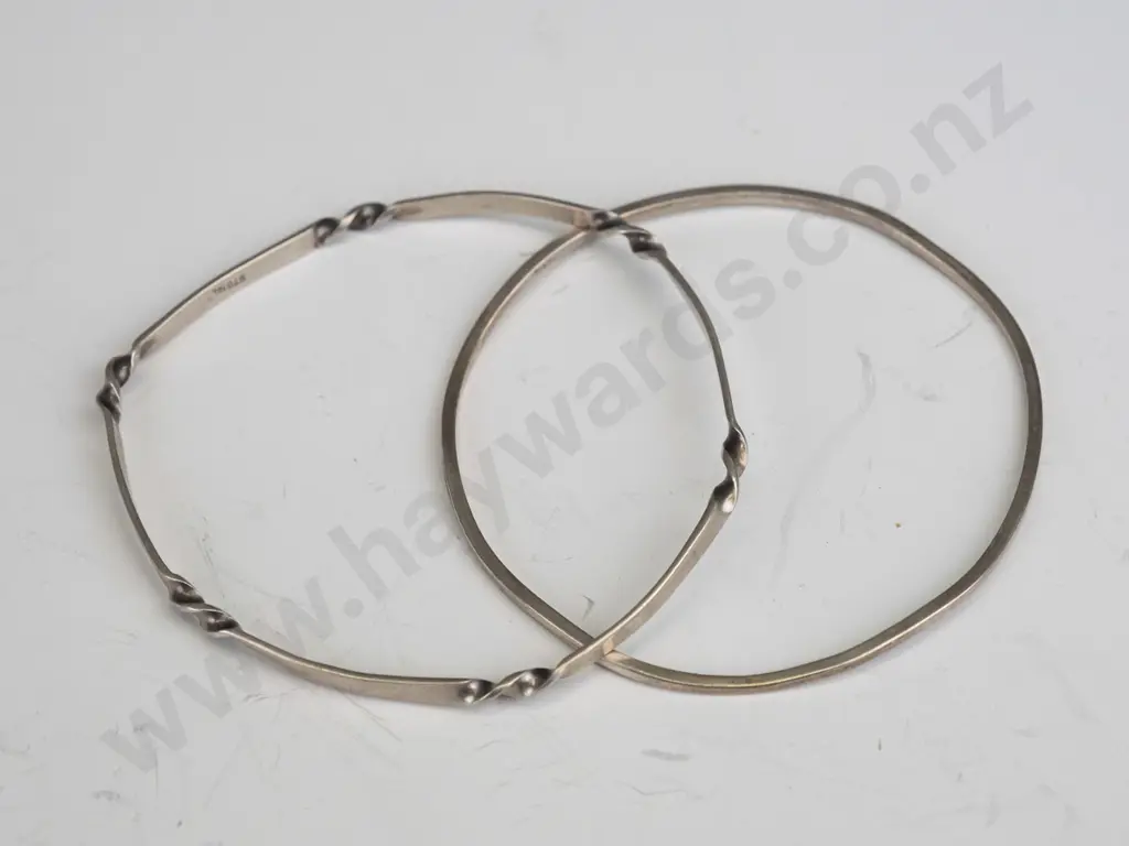 2 silver bangles both stamped stg sil Image 1++