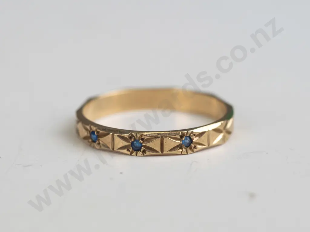 engraved band with 3 blue cz stamped 9 - 1.6gms - size 0 Image 1++