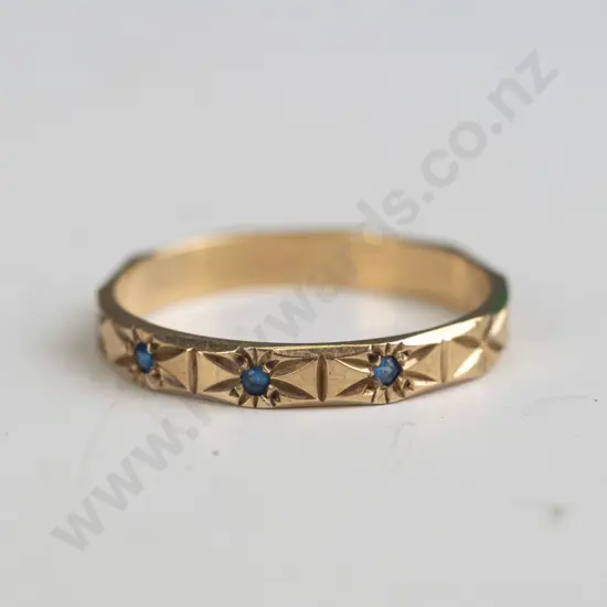 engraved band with 3 blue cz stamped 9 - 1.6gms - size 0