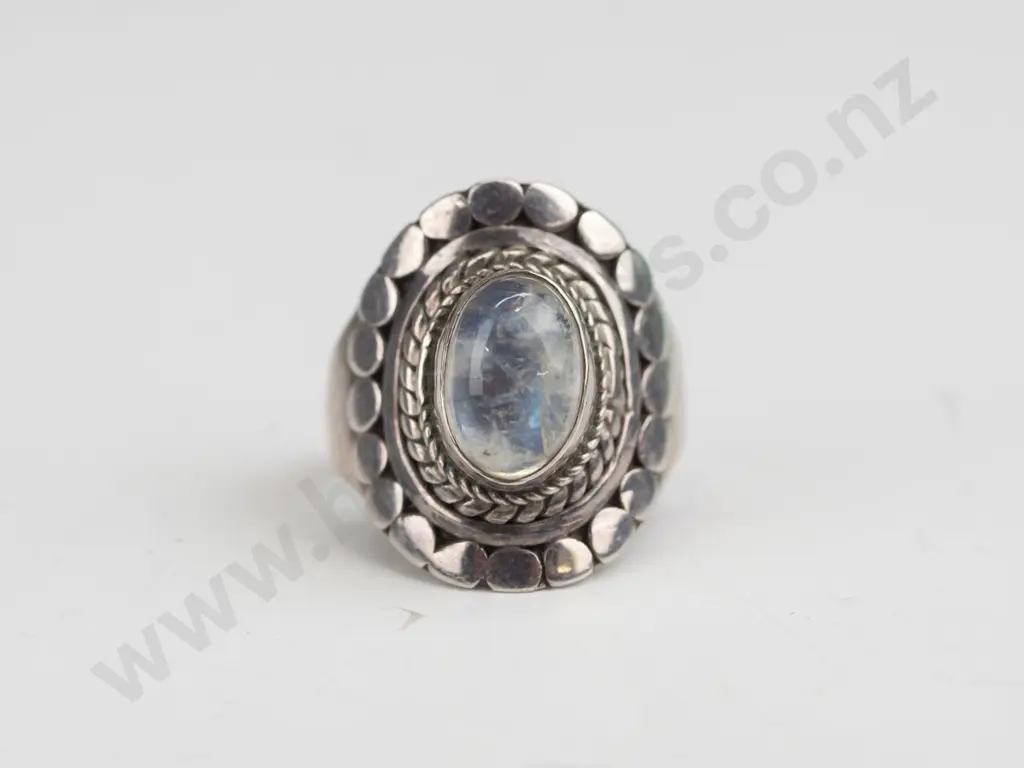silver ring with milky stone stamped 925 size N/O Image 1++