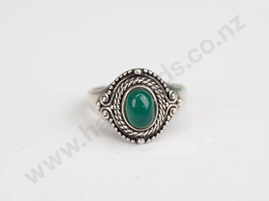 silver ring with green stone stamped 925 size Q Image 1++
