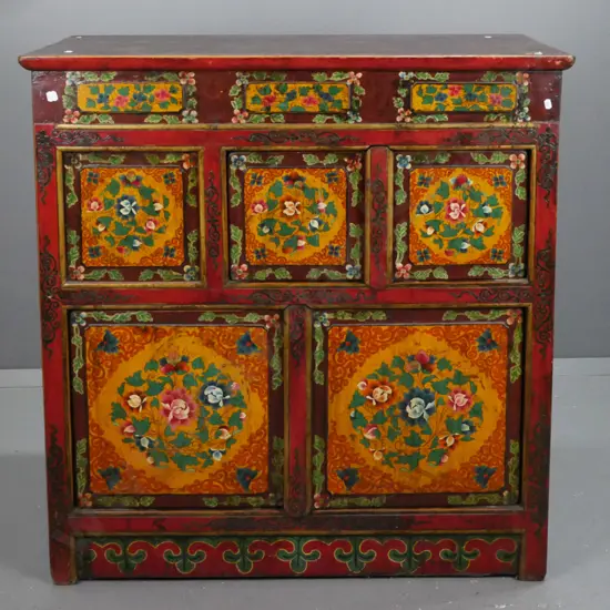 vintage Tibetan pine cabinet with intricate polychrome decoration on front, 2 large & 2 small cupboard doors, panelled