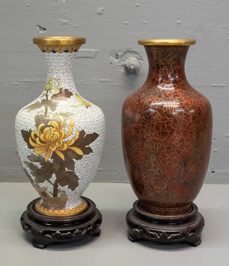 2 Chinese cloisonne vases on wooden stands, both floral and foliate motifs - brown tone with 1980s brochure, has small Image 1++