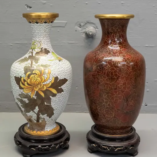 2 Chinese cloisonne vases on wooden stands, both floral and foliate motifs - brown tone with 1980s brochure, has small