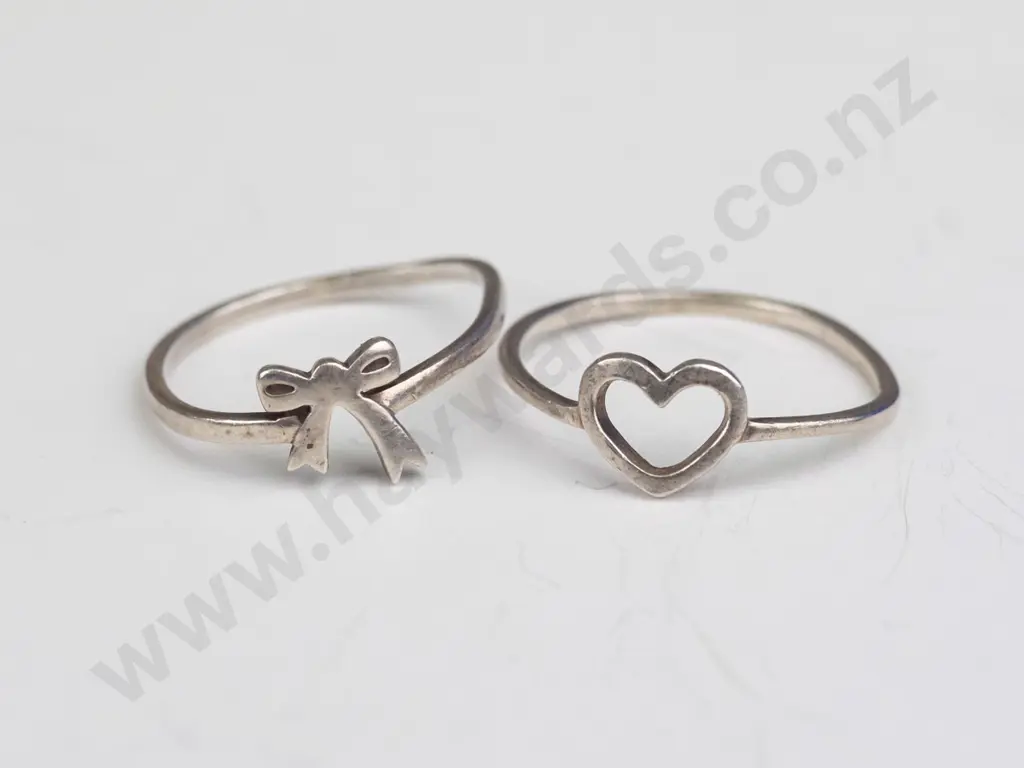 2 silver 'Karen Walker' rings both stamped 925 KW Bow size N Heart size R Image 1++