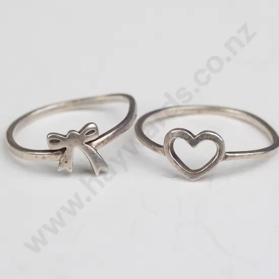 2 silver 'Karen Walker' rings both stamped 925 KW Bow size N Heart size R