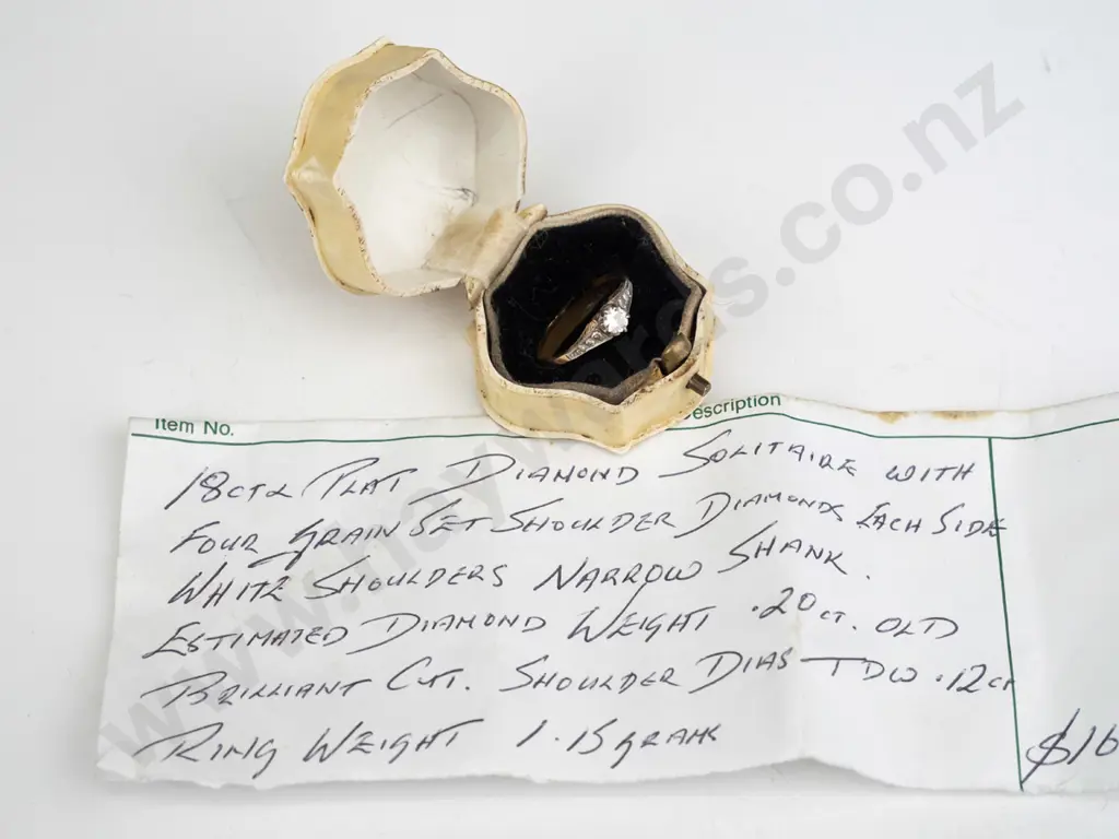 18ct platinum diamond solitaire with 4 grain set shoulder diamonds each side estimated diamond .20gms-shoulder diamonds Image 1++