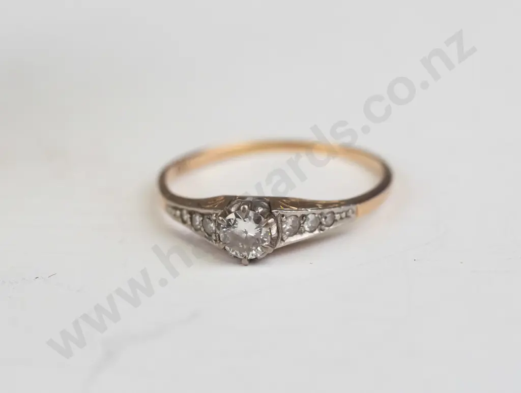 18ct platinum diamond solitaire with 4 grain set shoulder diamonds each side estimated diamond .20gms-shoulder diamonds Image 1++