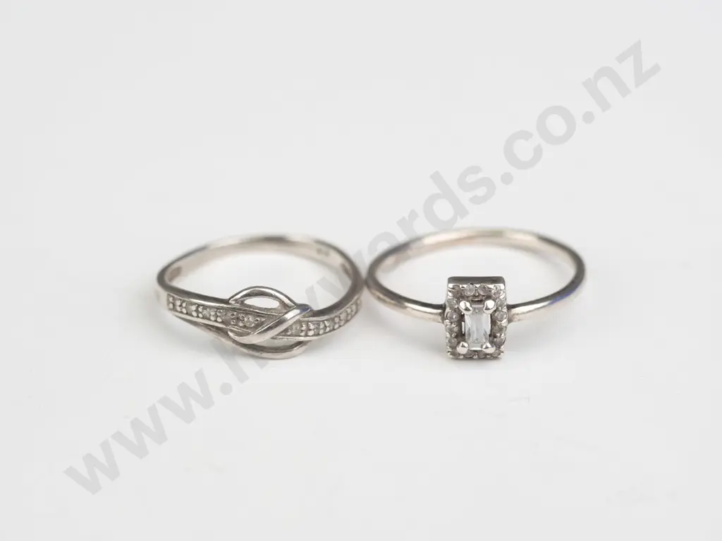 silver ring with cz size M & buckle style ring with cz both stamped 925 size K Image 1++