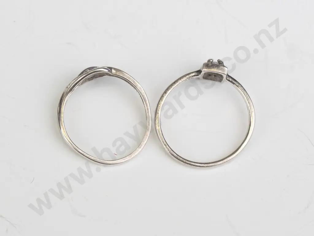 silver ring with cz size M & buckle style ring with cz both stamped 925 size K Image 1++