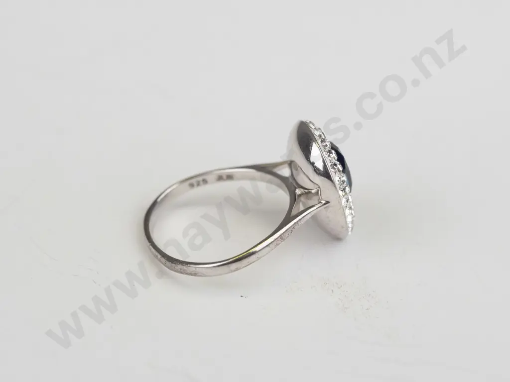 silver blue stone & cz ring stamped 925 size N Image 1++