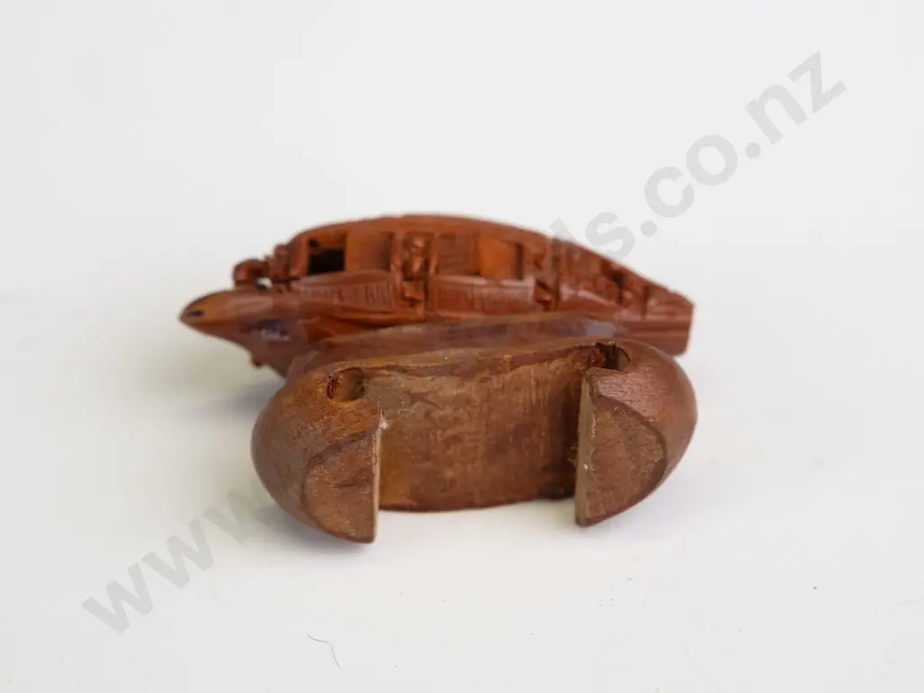 Chinese intricately carved fruit stone or pit, carved into boat shape with movable doors, mounted on wooden stand. Seems Image 1++