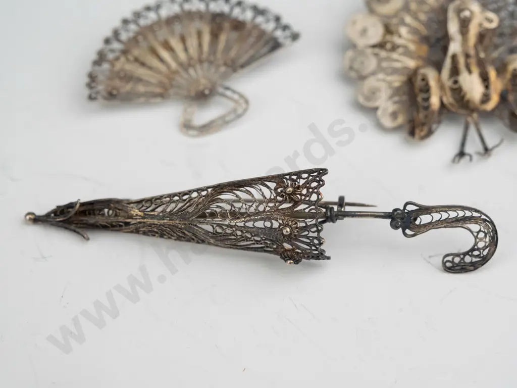 4 filagree brooches Image 1++