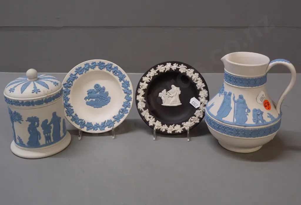 4 pieces of Wedgwood jasperware - 3 are blue on white ground, one black & white. Jug is H-135 Image 1++