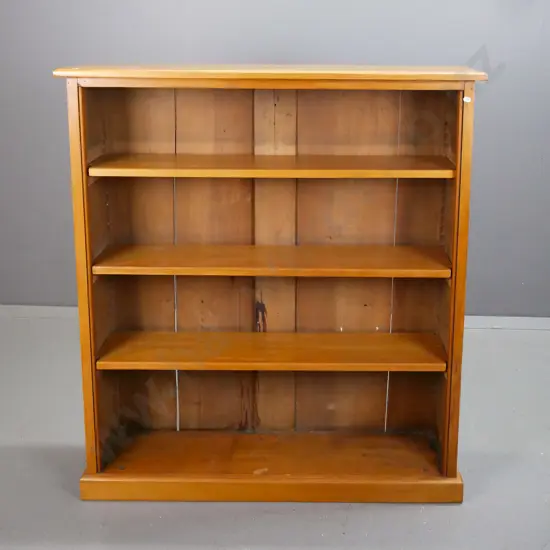 colonial rimu and kauri bookcase with 3 adjustable shelves - has loose back, sporadic borer in back and sides, shelves
