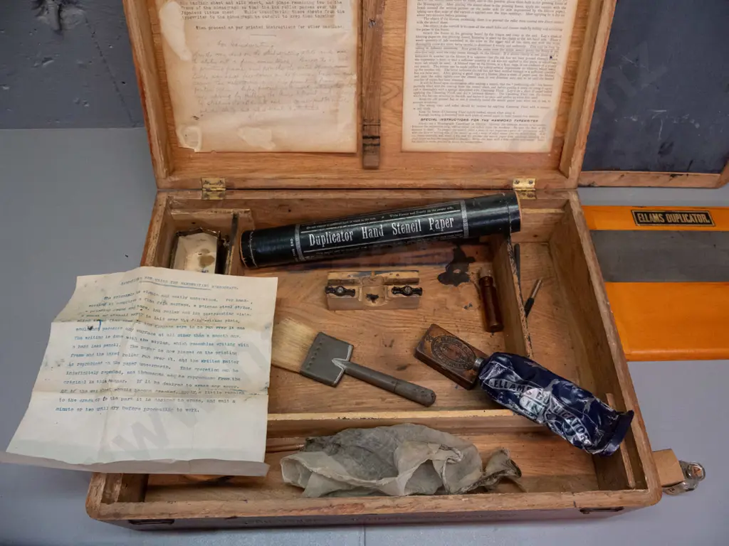 vintage Edison Mimeograph in elm case with hinged lid, assorted attachments, parts and ink from an Ellams Duplicator etc Image 1++