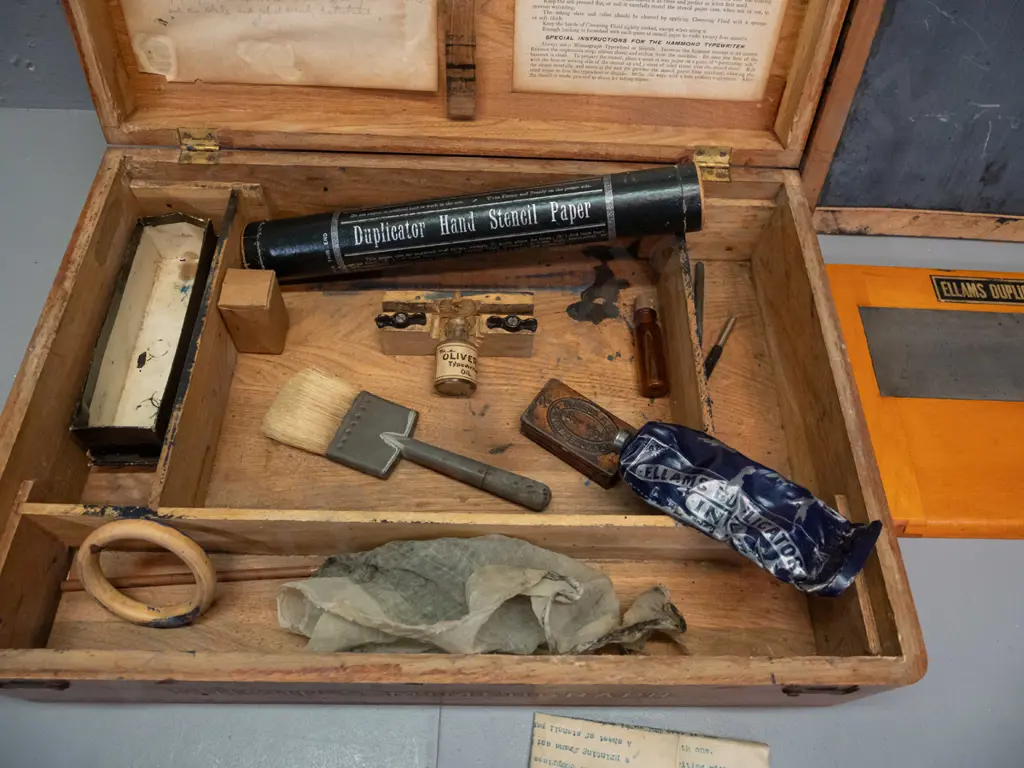 vintage Edison Mimeograph in elm case with hinged lid, assorted attachments, parts and ink from an Ellams Duplicator etc Image 1++