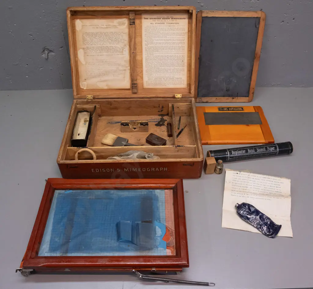 vintage Edison Mimeograph in elm case with hinged lid, assorted attachments, parts and ink from an Ellams Duplicator etc Image 1++