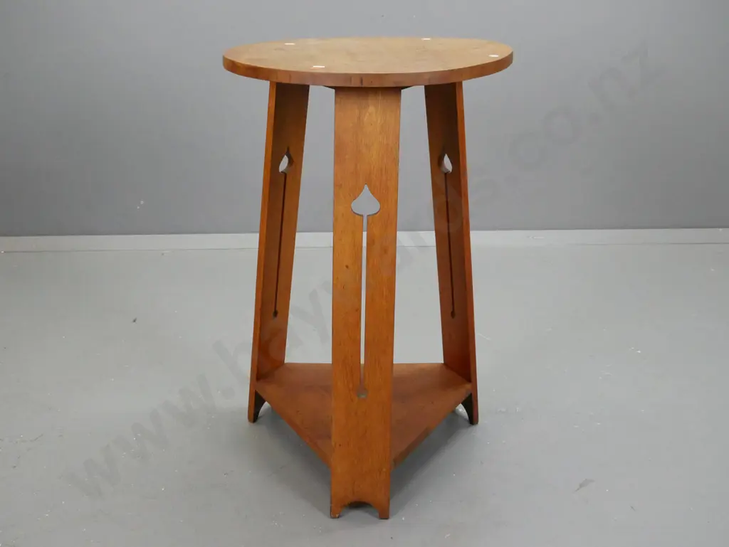 art nouveau oak side table with circular top and pierced arrow sides. H770 Diam450 Image 1++