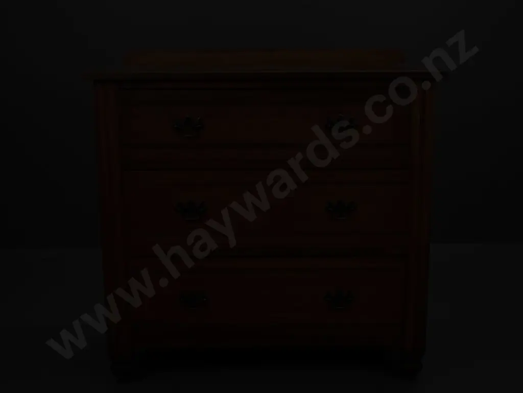 colonial rimu 3 drawer chest on turned bun feet with replacement brass handles, slight borer to top Image 1++