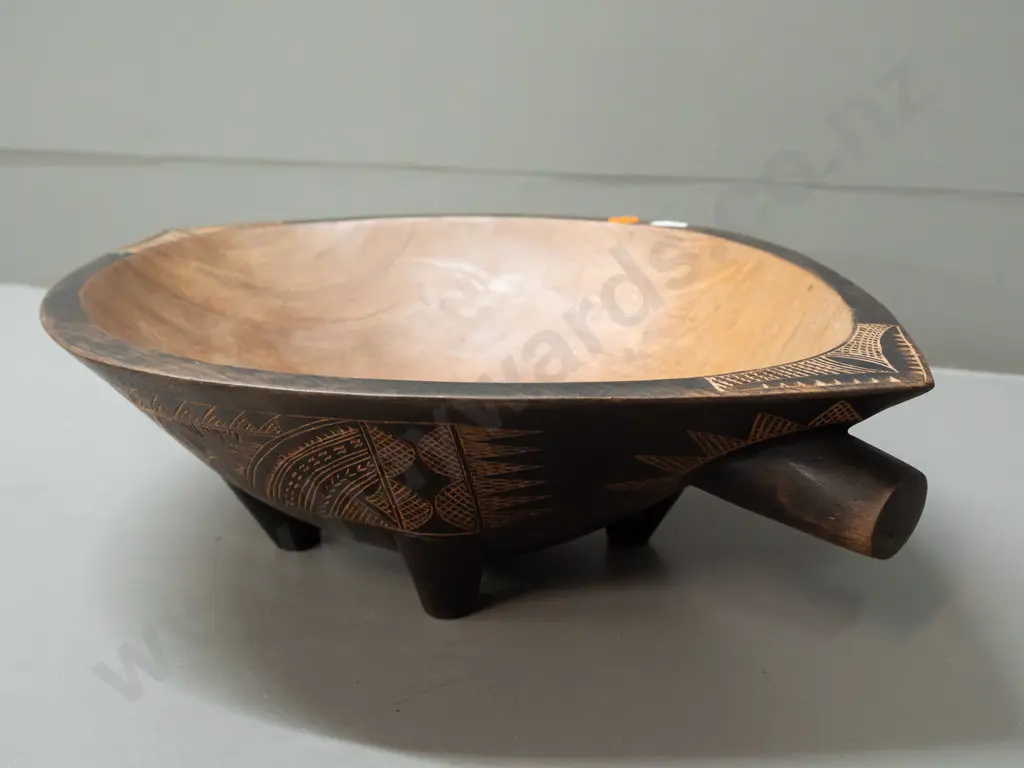 carved hardwood food bowl with bands of Pacific island style decoration, 4 feet, handles at ends - some discolouration Image 1++