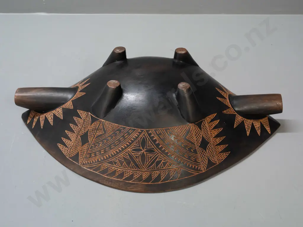 carved hardwood food bowl with bands of Pacific island style decoration, 4 feet, handles at ends - some discolouration Image 1++