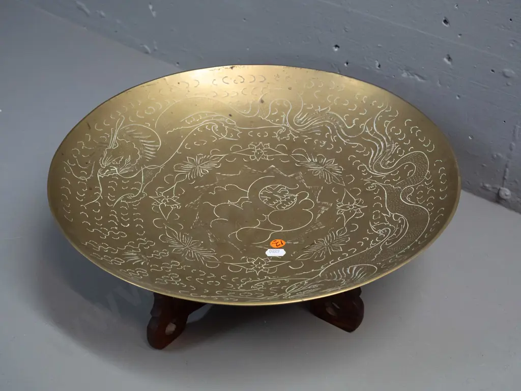 large brass bowl with etched dragon motifs, marked made in China on base, on 2 piece collapsible pierced wood stand, Image 1++