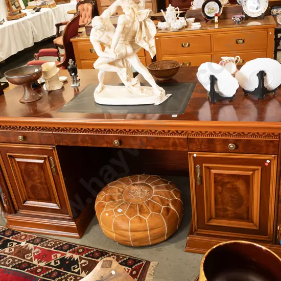contemporary reproduction large double pedestal desk with walnut and mahogany veneer, moulded plastic decoration, brass