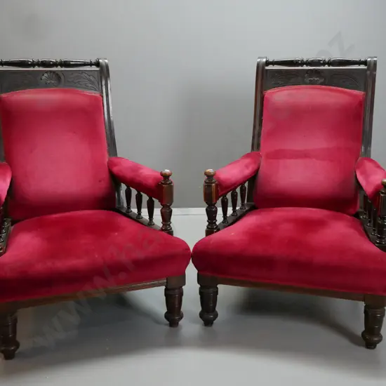 pair of late Victorian beech and mahogany open-armed armchairs with turned top rail, carved back and rails, turned front