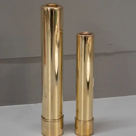 2 heavy brass kaleidoscopes, smaller one working, larger needs coloured pieces added L-235