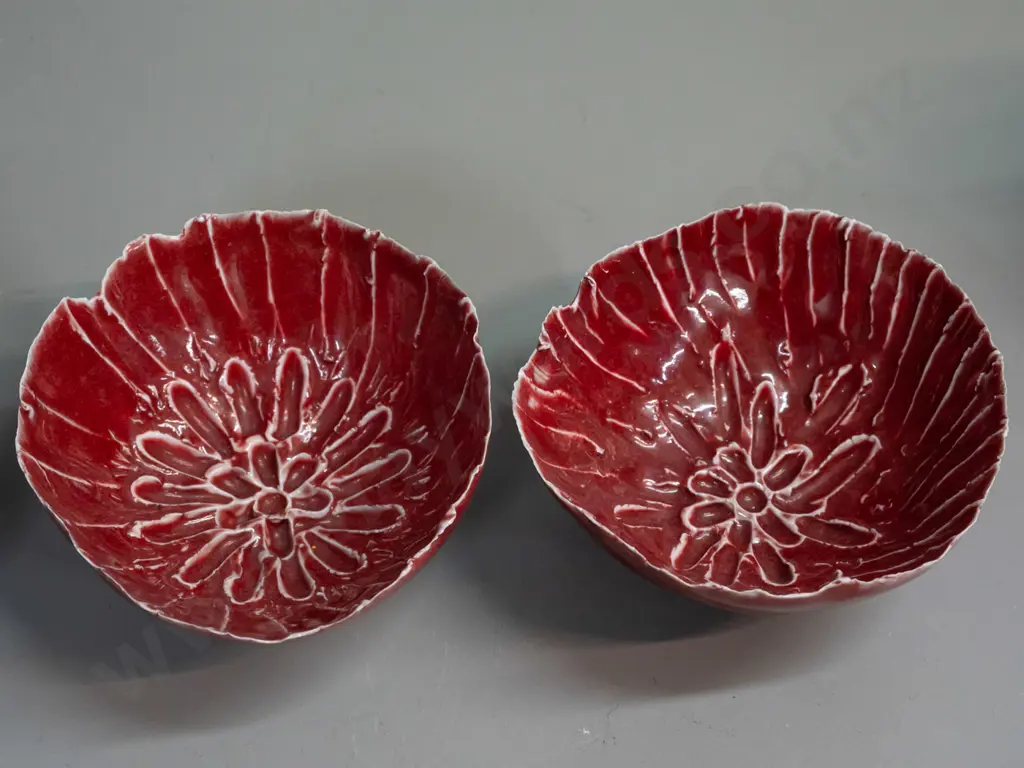 3 studio pottery bowls - Cath Wylie (Tasmania) blue crystalline glaze and 2 red with organic leaf forms, unknown maker's Image 1++
