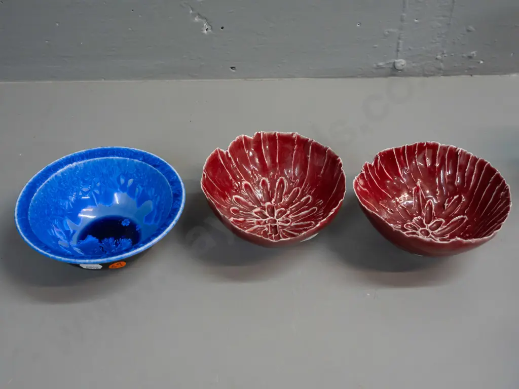 3 studio pottery bowls - Cath Wylie (Tasmania) blue crystalline glaze and 2 red with organic leaf forms, unknown maker's Image 1++