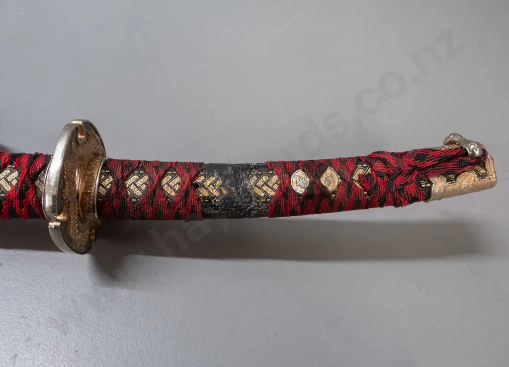 decorative reproduction Japanese sword w/ red and black cloth binding, gold and silver-colour alloy fittings, stainless Image 1++