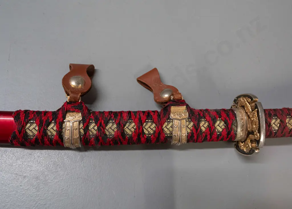 decorative reproduction Japanese sword w/ red and black cloth binding, gold and silver-colour alloy fittings, stainless Image 1++