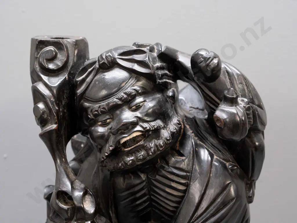 Chinese large carved hardwood figure of scholar with staff, one leg on tree roots, holding child, carved white teeth and Image 1++