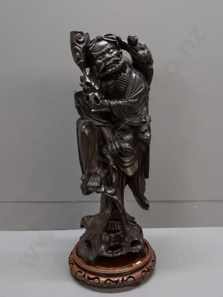 Chinese large carved hardwood figure of scholar with staff, one leg on tree roots, holding child, carved white teeth and Image 1++
