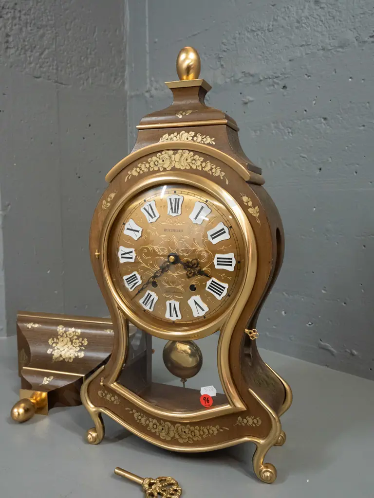 rococo style bracket clock in walnut case with gilded brass feet and decoration, floral transfers, glazed door and sides Image 1++