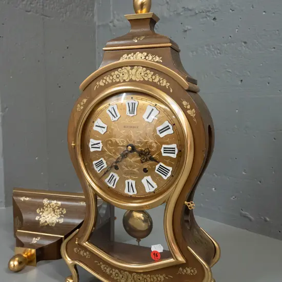 rococo style bracket clock in walnut case with gilded brass feet and decoration, floral transfers, glazed door and sides