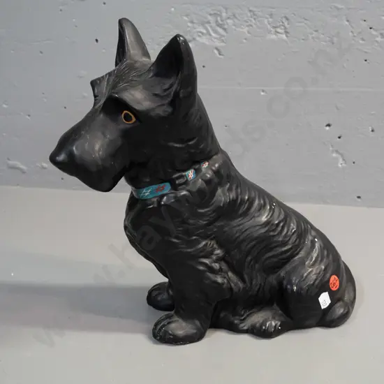 vintage (Sylvac?) pottery seated Scottie dog figure - has "Made in England" and reg no 778501 on base. Some chipping to