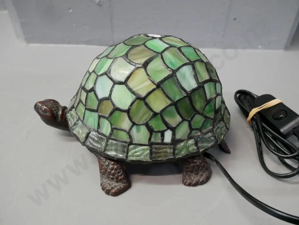 tortoise table lamp, cast metal base, multiple shades of green leadlight shell, going. H-130 L-220 Image 1++