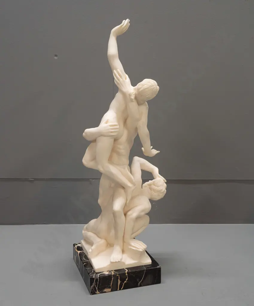 composite group of 3 classical style figures on black veined marble base - figure marked G Ruggeri - has had repair to Image 1++