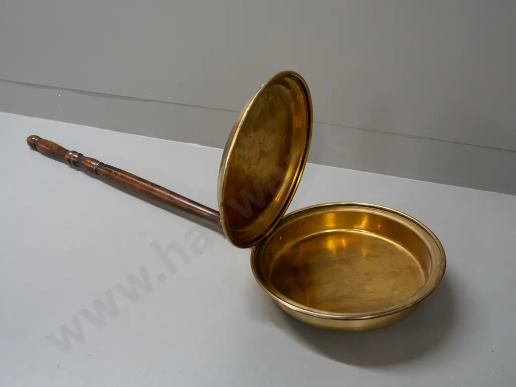 brass bed-warmer with turned wooden handle, etched decoration on lid - handle a little loose, some discolouration to lid Image 1++