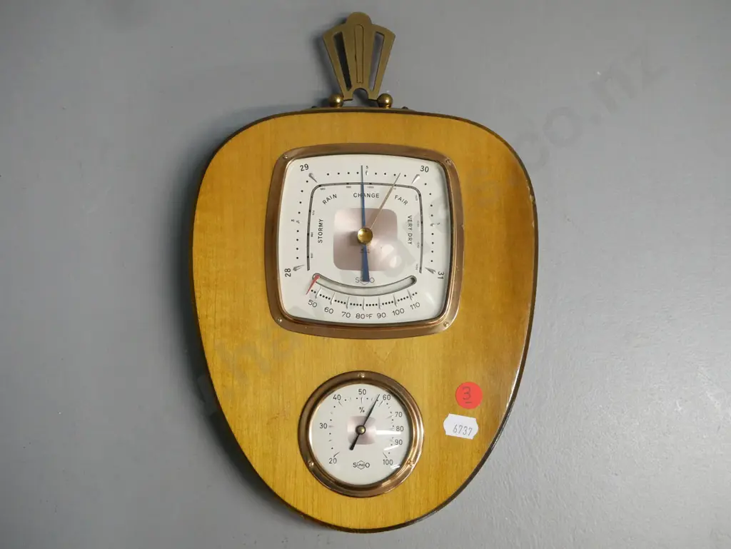 wall hanging wooden shield-shaped barometer w/ thermometer & hygrometer w/ keystone hanger. Sundo brand W. Germany. Image 1++