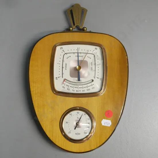 wall hanging wooden shield-shaped barometer w/ thermometer & hygrometer w/ keystone hanger. Sundo brand W. Germany.