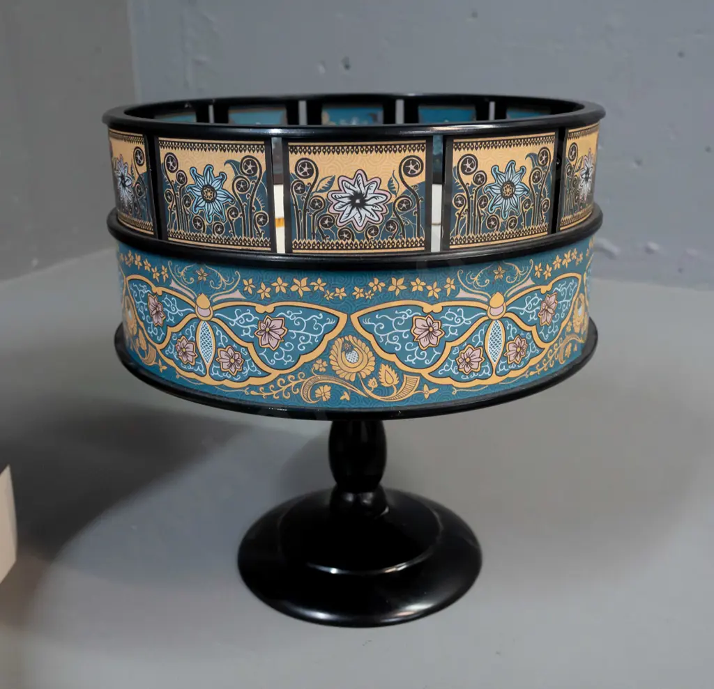 Hemisferium reproduction zoetrope moving picture device with spinning gallery and assorted paper animation image strips Image 1++