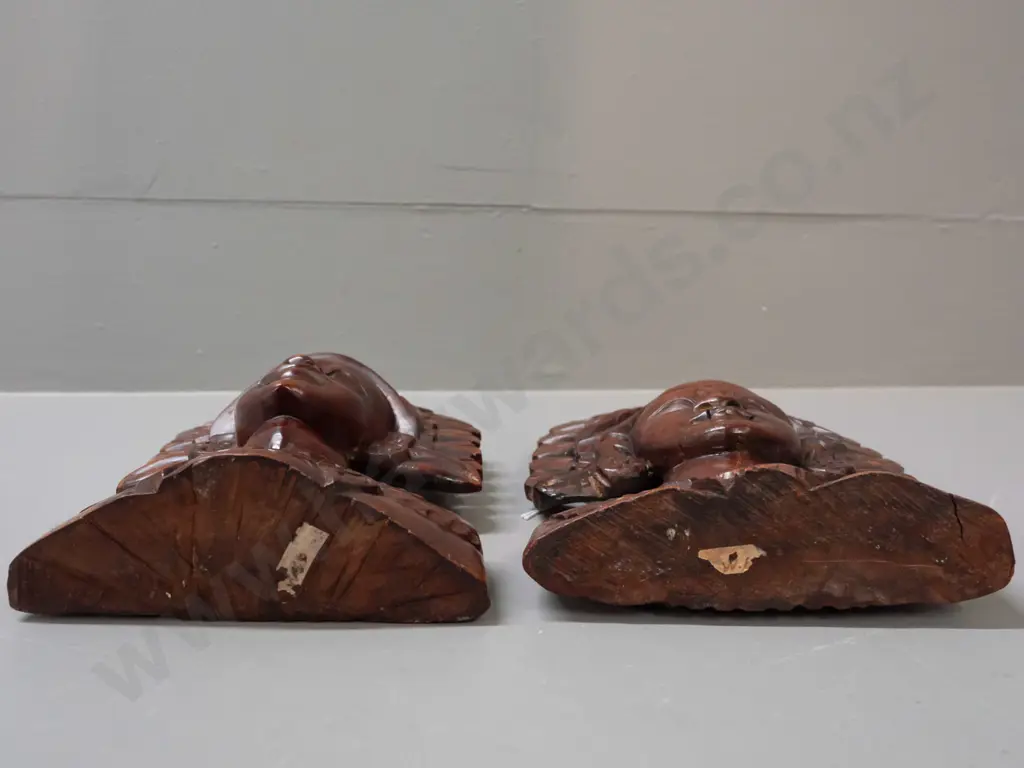 2 carved Indonesian hardwood busts with pierced edges - one with wall hanging eyelet in back - both with a few small Image 1++