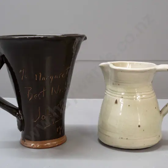 2 studio pottery jugs - one tall flared design inscribed To Margaret Best Wishes John Pollex 1990 - and one other with